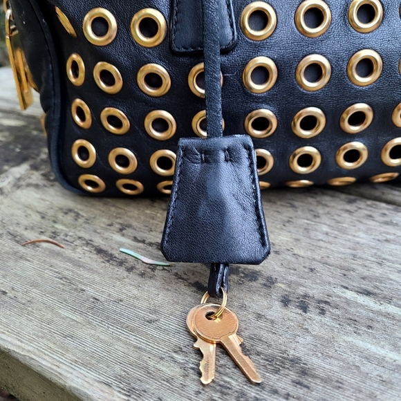 Prada Gold Grommet Black Leather Hand Bag w/ Lock and Keys - Picture 6 of 11